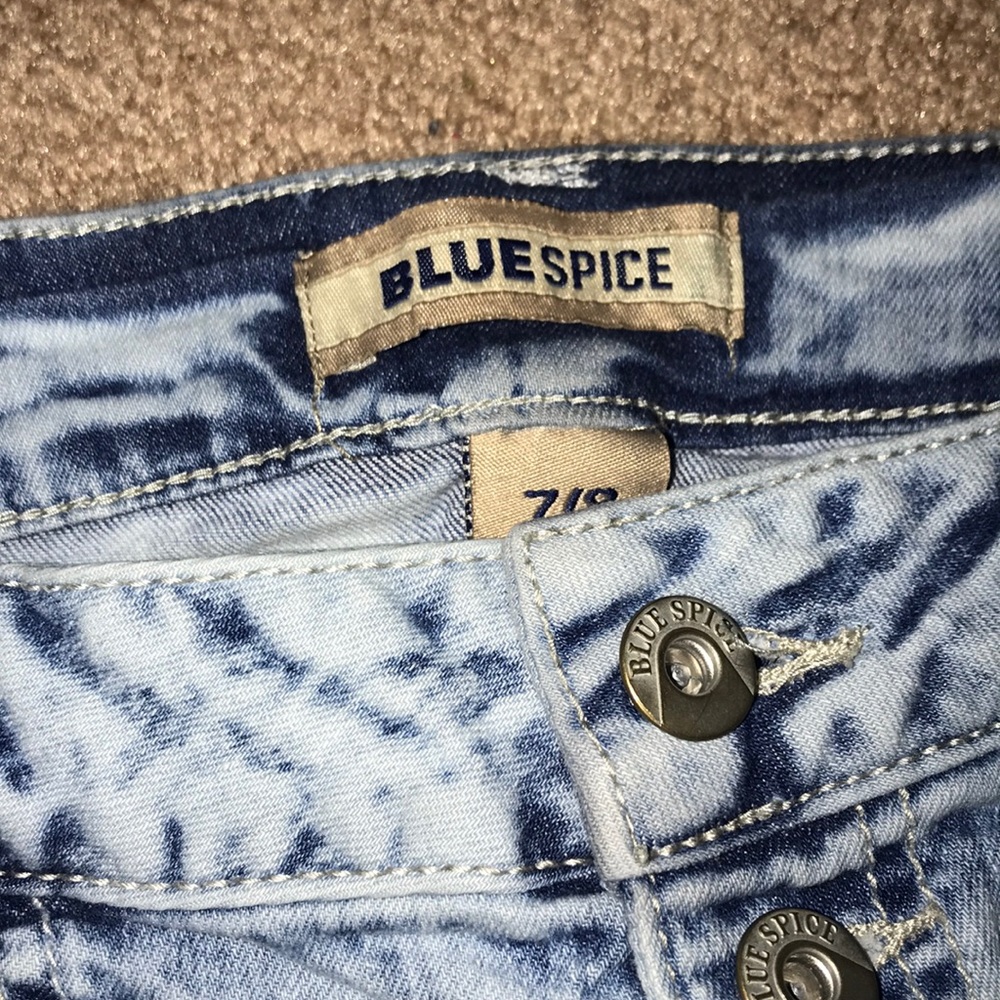 Light blue ripped jeans